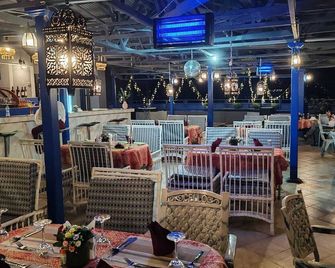 The Golden Pigeon Hotel And Spa - Мванза - Ресторан