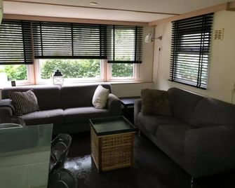 Gezellig chalet voor gezinnen op de Veluwe I Veldkamp F16 - Epe - Wohnzimmer