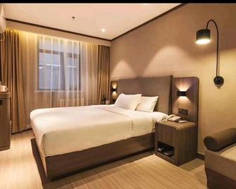 Hanting Hotel Cangzhou Jiefang Road - Cangzhou - Bedroom