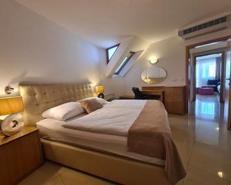 Pr Klaudiji Guest House Bled - בלד - חדר שינה