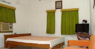 Hotel Upasana - Bhubaneswar - Phòng ngủ