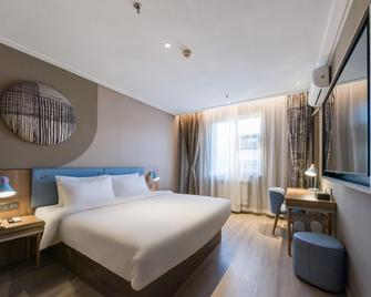 Home Inn Neo Jinan Daming Lake Railway Station Chaoran Tower - Jinan - Bedroom