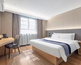 Home Inn Aifeel Hotel (Nantong Yaogang Road Haohe Scenic Area Branch) - Nantong - Schlafzimmer