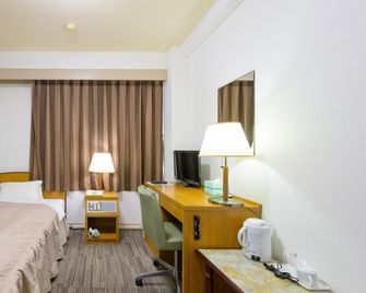 Hisai Green Hotel - 津市 - 臥室