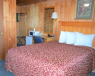 Green Acre Motel By OYO Near Rush County Airport - La Crosse - Habitación