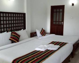 Otha Shy Airport Transit Hotel - Katunayake - Schlafzimmer