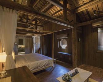 Tsingpu Fujian Tulou Retreat - Zhangzhou - Bedroom
