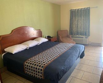 Texas Inn Beaumont - בומונט - חדר שינה