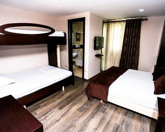 هوتل تاون هاوس - تيرانا - غرفة نوم