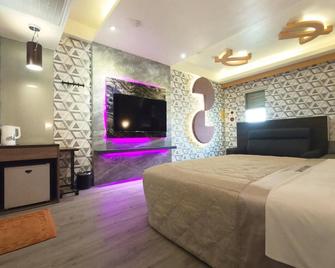 Shihu Motel - Xihu Township - Bedroom