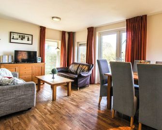 Kg - Vakantiewoning 11 - Opperdoes - Wohnzimmer