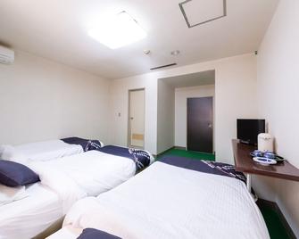 Tabist Business Hotel Chitose Kashiwazaki - Kashiwazaki - Schlafzimmer