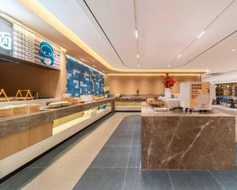 Home Inn Neo · Linyi Yi River Road International Convention Center - Linyi - Front desk