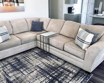 Experience country life near all the cities amenities. - Riverbank - Living room