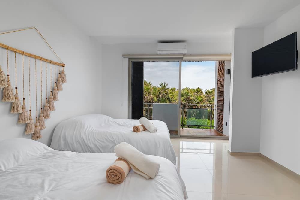Angelina 28 Beachfront and Family Apartments - Modern and Relaxing Long Stays - 20 min from Cancun Airport - Puerto Morelos - Schlafzimmer