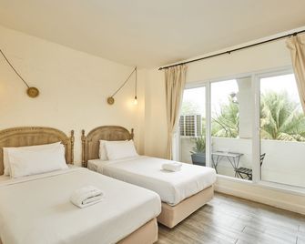 Talay Hotel and Villa Cha-am - צ'א-אם - חדר שינה