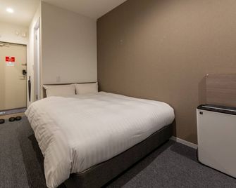 Hotel R9 The Yard Ena - Ena - Спальня