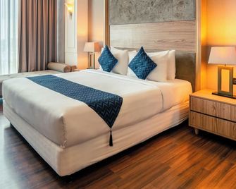 Azana Suites Hotel Antasari - Giacarta - Camera da letto