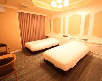 Royal Hotel Shinokubo - Tokyo - Bedroom