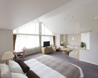 Rusutsu Resort Hotel & Convention - Русуцу - Спальня