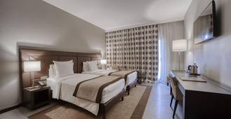 ホテル アクワ パレス - ドゥアラ - 寝室