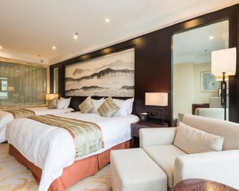 International Center Hotel - Yingkou - Schlafzimmer