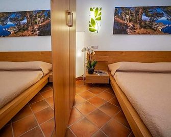 Casa Lucia Relaxing rooms - אנאקאפרי - חדר שינה