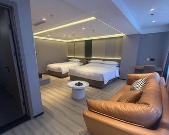 Dantie Hotel - Dandong - Camera da letto