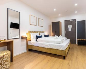 Chérisy Hotel Konstanz - Self Check-in Only - Konstanz - Schlafzimmer