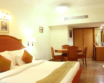 Saj Luciya -A Classified 4 Star Hotel - Thiruvananthapuram - Camera da letto
