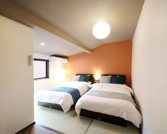 Kyoto Nishijin Guest House - קיוטו - חדר שינה