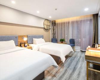 Home Inn Taiyuan South Inner Ring Bingzhou South Road Dayingpan - تاييوان - غرفة نوم