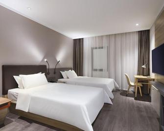 Hanting Hotel Nanjing Hexi International Expo Center - Nanjing - Bedroom