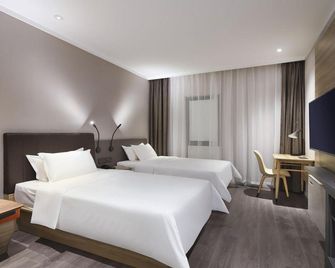 Hanting Hotel Nanjing Hexi International Expo Center - نانجينغ - غرفة نوم