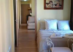 Apartamentos Turísticos La Garza - Cáceres - Schlafzimmer