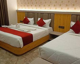 The Sky Comfort Hotel Mahi - Dwārka - Schlafzimmer