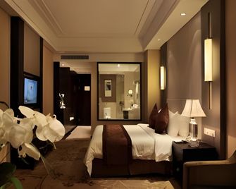 Ondine International Hotel - Zhenjiang - Bedroom