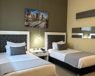 Mirago Hotel - Yumbo - Habitación