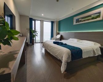 Jianglin Grand Hotel (Nanchong Wangfujing Shopping Center Branch) - Nanchong - Bedroom