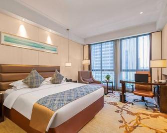 Purple Gold Hotel - Yancheng - Schlafzimmer