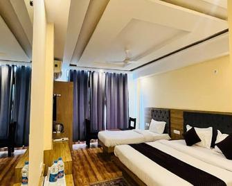 The Fragrance Hotel - Katra - Schlafzimmer