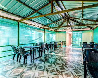 OYO 49497 Sulochana Resort - Mālvan - Restaurant