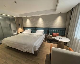 Yilong Anyun Hotel (Nantong Haohe Scenic Area Branch) - Нантон - Спальня