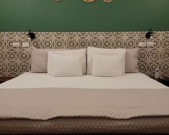 هوتل كون كورازون - غرانادا - غرفة نوم