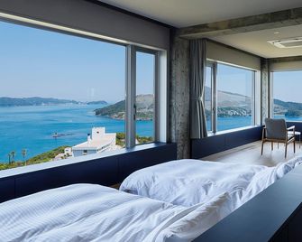 Hotel Resort Saikatei - Toba - Schlafzimmer