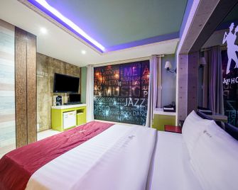 Buan Gyeokpo Jazz Motel And Pension - Buan - Habitación