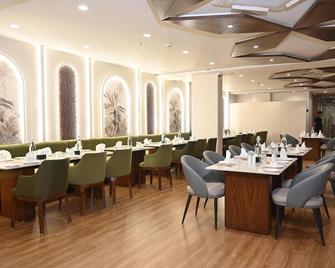 Pam Premium Hotel Vadodara - Vadodara - Restaurant