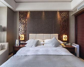 Soluxe Hotel Urumqi - Ürümqi - Bedroom
