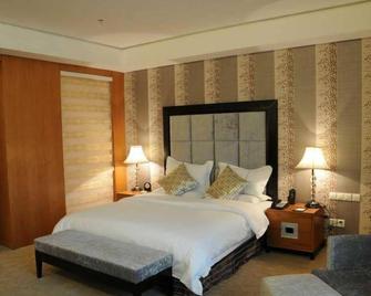 Lvliang Oriental Lily Hotel - Lüliang - Bedroom