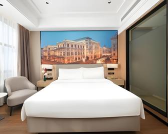 Vienna International Hotel Zhejiang Jiashan Xitang Branch - Jiaxing - Soverom